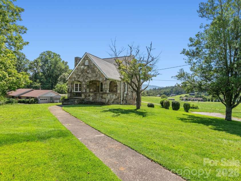 1279 Charlotte Highway, Fairview, NC 28730.  MLS# CAR4421024, YatesRealty ID 48430. Lots of yard