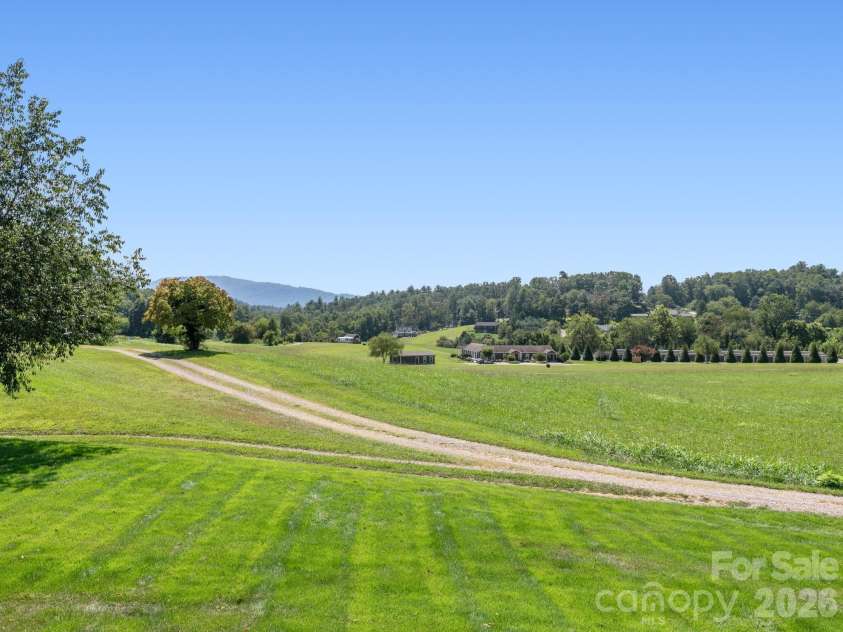 1279 Charlotte Highway, Fairview, NC 28730.  MLS# CAR4421024, YatesRealty ID 48430. Views from the back yard