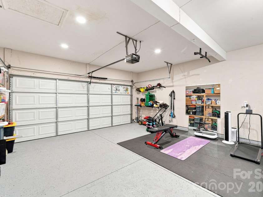 2902 Oakdale Road, Charlotte, NC 28216.  MLS# CAR4421172, YatesRealty ID 48436. Epoxy Garage