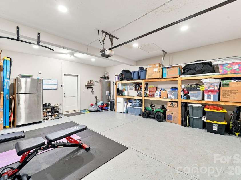 2902 Oakdale Road, Charlotte, NC 28216.  MLS# CAR4421172, YatesRealty ID 48436. Garage features ample storage