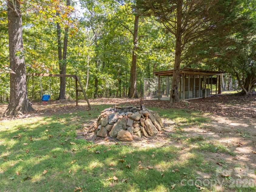 1360 Harris Holly Springs Road, Rutherfordton, NC 28139.  MLS# CAR4412774, YatesRealty ID 48437. Fire Pit
