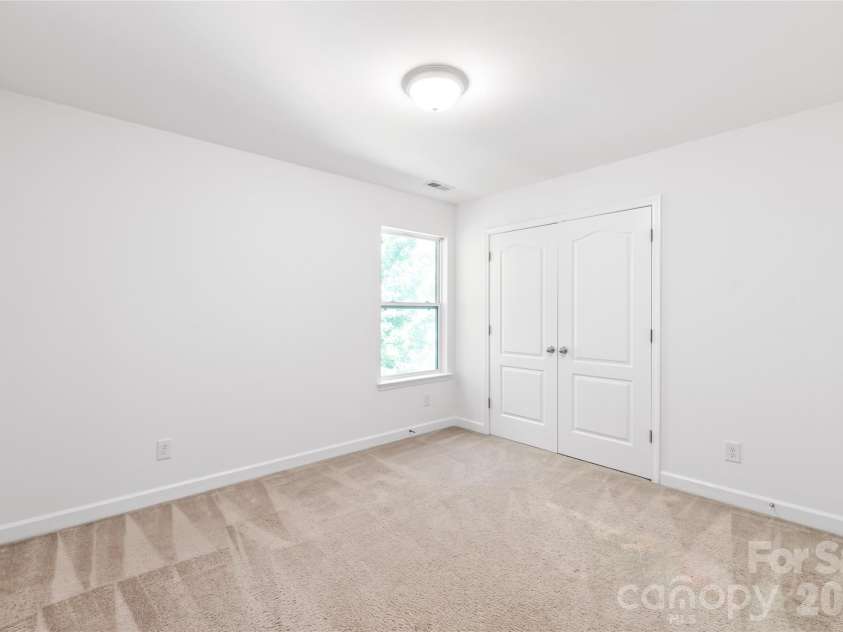 6404 Lanzerac Manor Drive, Charlotte, NC 28269.  MLS# CAR4415677, YatesRealty ID 48440. Bedroom 2