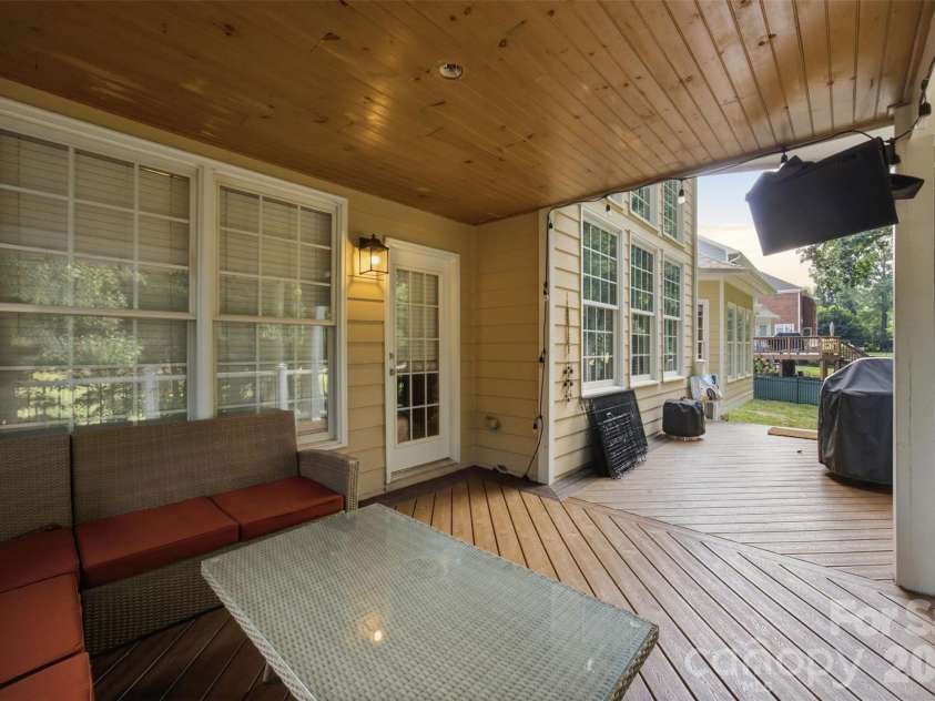 10104 Devonshire Drive, Huntersville, NC 28078.  MLS# CAR4419902, YatesRealty ID 48442. Back Covered Patio