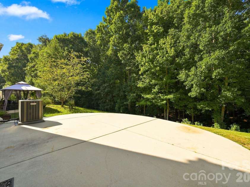 422 Danielle Way, Fort Mill, SC 29715.  MLS# CAR4420672, YatesRealty ID 48449. Back yard is wooded