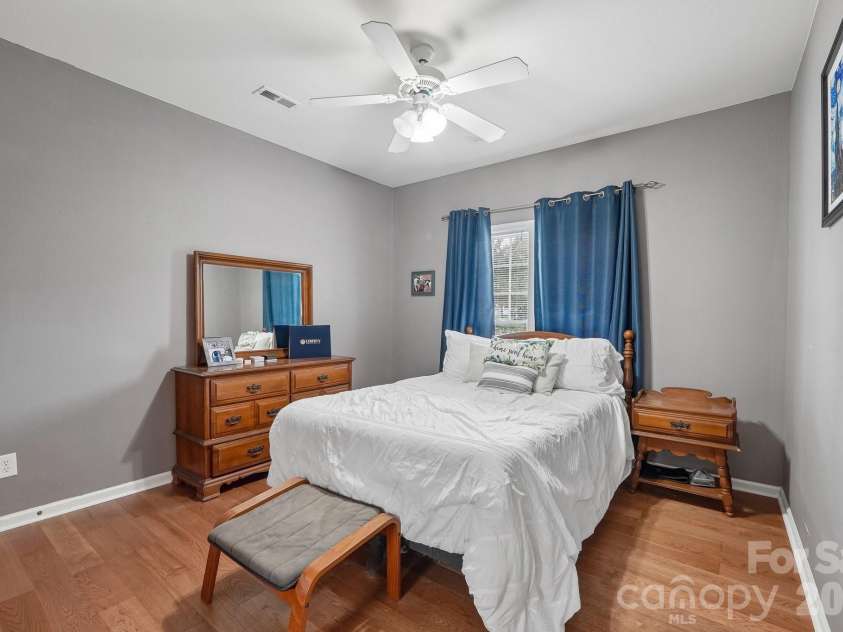 6219 Tyrel Lane, Harrisburg, NC 28075.  MLS# CAR4420588, YatesRealty ID 48450. Main level primary bedroom suite