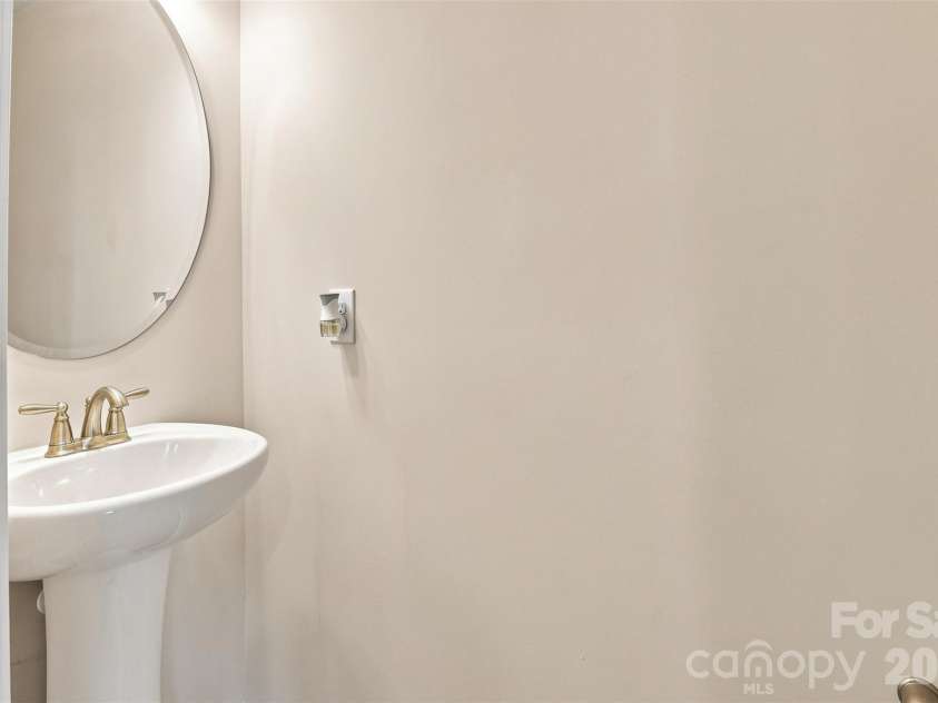 15704 Reynolds Drive, Indian Land, SC 29707.  MLS# CAR4419421, YatesRealty ID 48457. Half bathroom upstairs