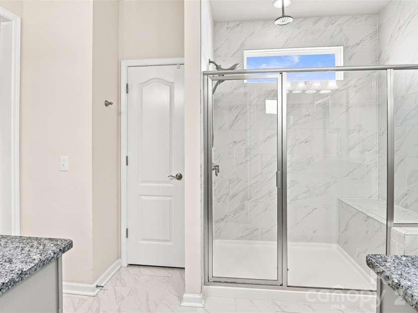 15704 Reynolds Drive, Indian Land, SC 29707.  MLS# CAR4419421, YatesRealty ID 48457. Walk in shower