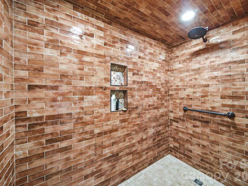 10400 Old Beatty Ford Road, Rockwell, NC 28138.  MLS# CAR4411999, YatesRealty ID 48469. Primary Ensuite Bath- Zero-Step Entry Shower