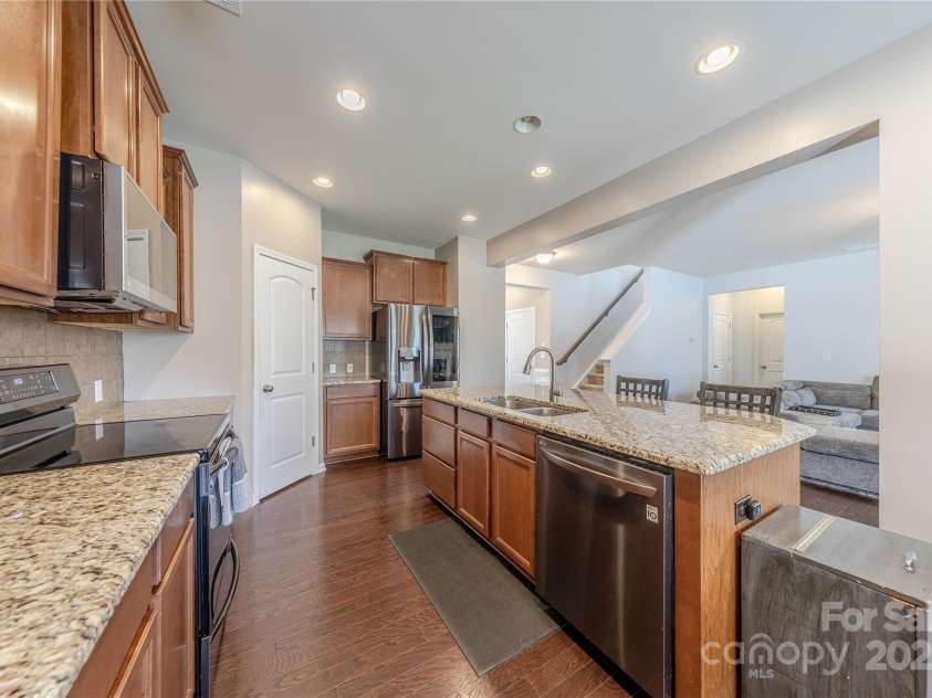 3613 Martele Drive, Mint Hill, NC 28227.  MLS# CAR4240741, YatesRealty ID 4847. Chef's Kitchen has granite counter tops and large center island