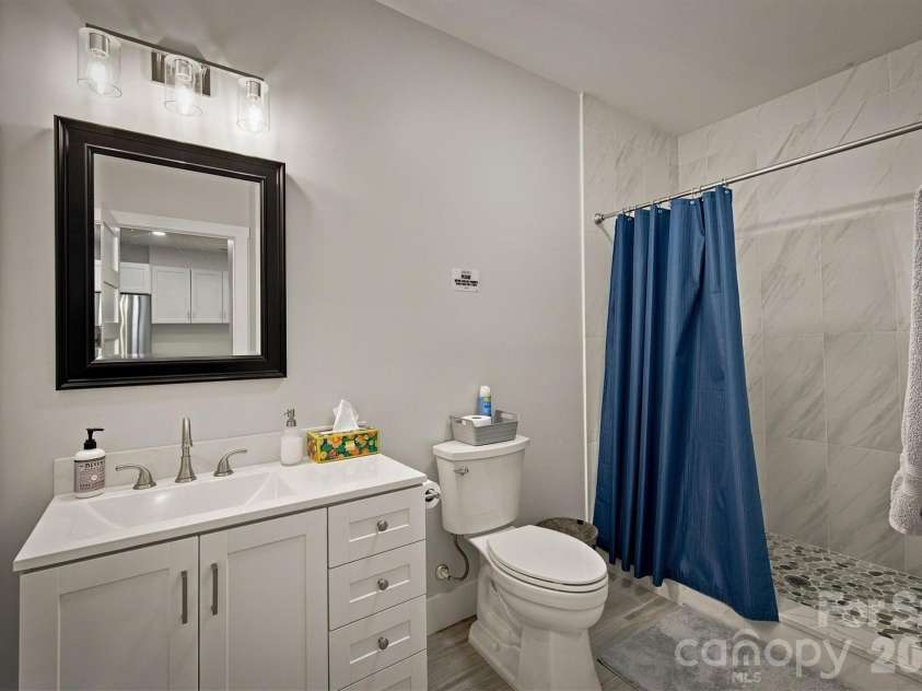 2371 Paradise Harbor Drive, Connelly Springs, NC 28612.  MLS# CAR4415547, YatesRealty ID 48470. Bathroom in basement
