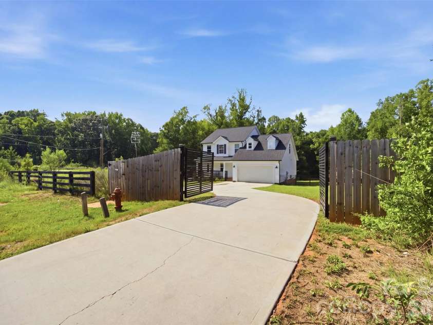 1382 Rebound Road, Lancaster, SC 29720.  MLS# CAR4415377, YatesRealty ID 48471. Private gate entrance