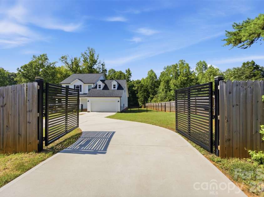 1382 Rebound Road, Lancaster, SC 29720.  MLS# CAR4415377, YatesRealty ID 48471. Private gate entrance