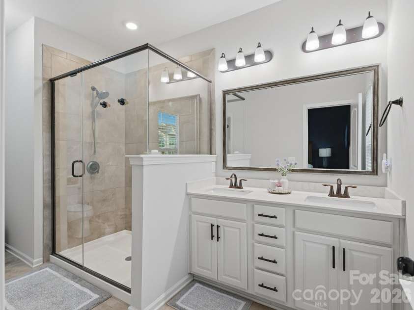 1110 Whitby Moore Street, Charlotte, NC 28273.  MLS# CAR4414562, YatesRealty ID 48476. Primary bathroom
