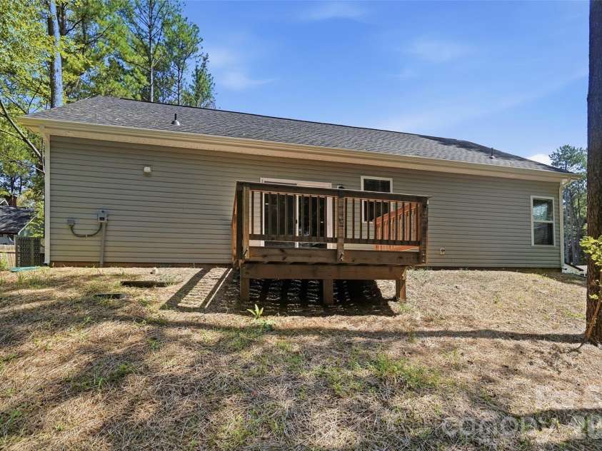 318 Honeywood Lane, Monroe, NC 28110.  MLS# CAR4412708, YatesRealty ID 48478. Back Yard