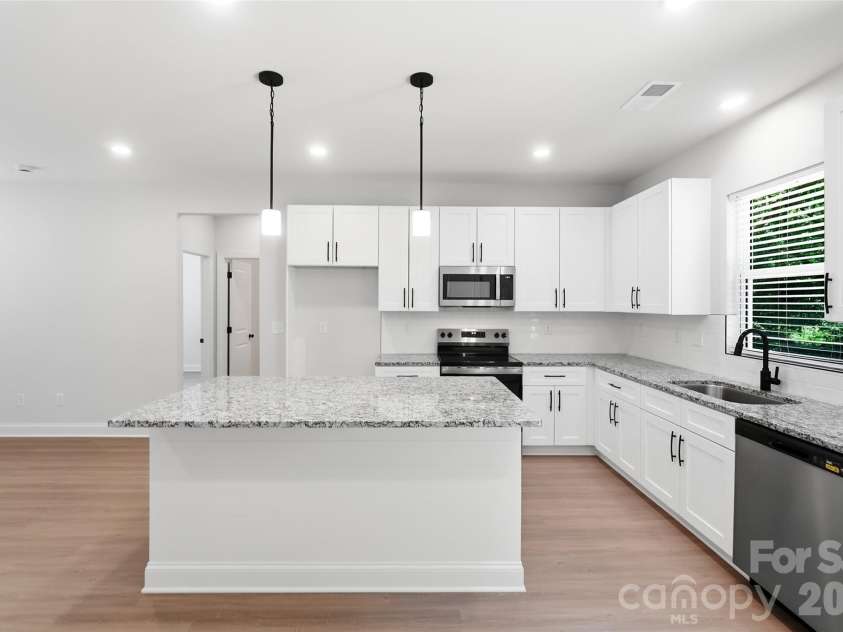 318 Honeywood Lane, Monroe, NC 28110.  MLS# CAR4412708, YatesRealty ID 48478. Kitchen