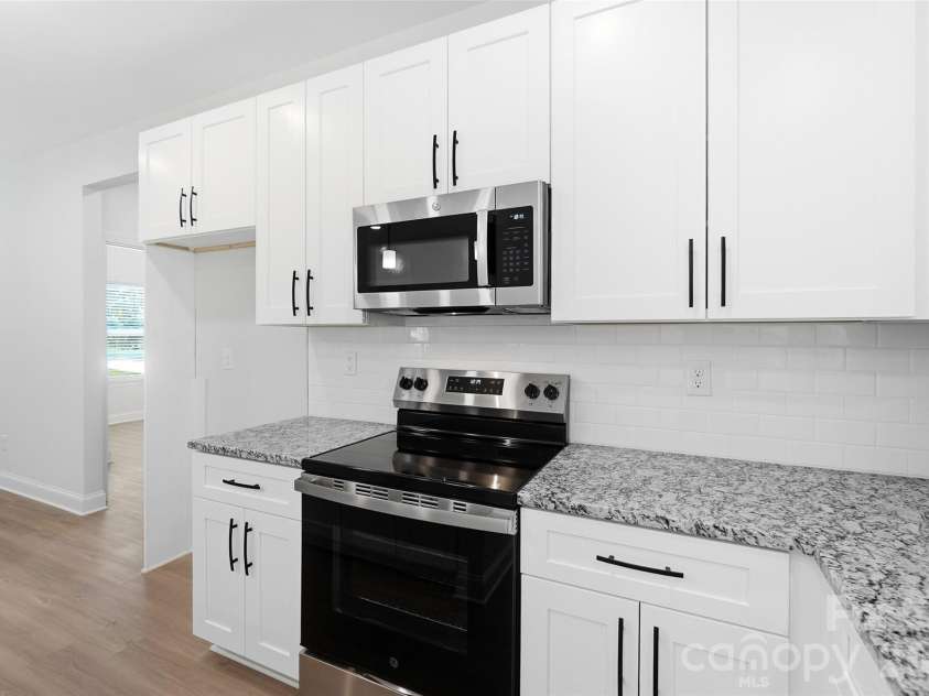 318 Honeywood Lane, Monroe, NC 28110.  MLS# CAR4412708, YatesRealty ID 48478. Kitchen