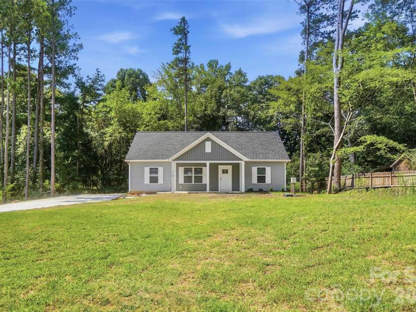 318 Honeywood Lane, Monroe, NC 28110.  MLS# CAR4412708, YatesRealty ID 48478. Setback from Road
