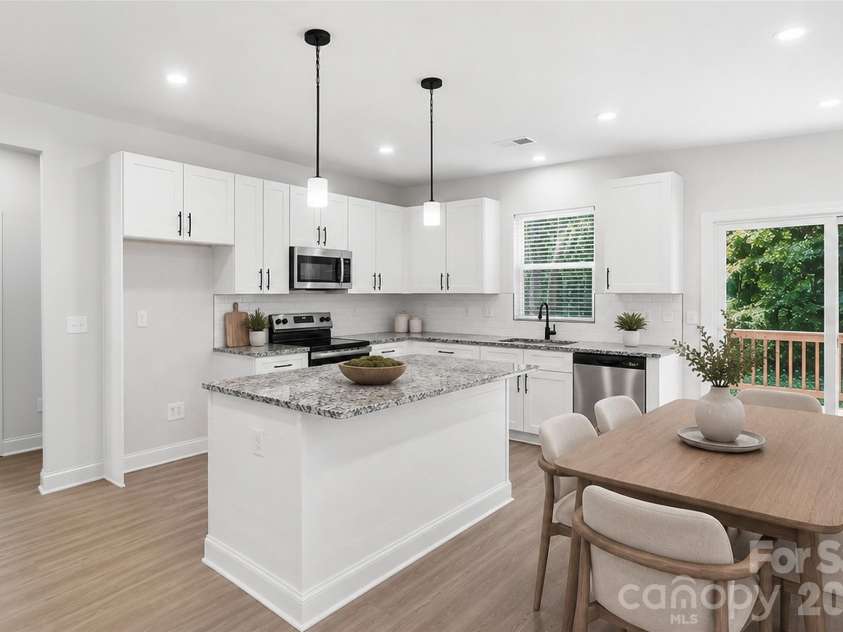 318 Honeywood Lane, Monroe, NC 28110.  MLS# CAR4412708, YatesRealty ID 48478. Virtually Staged Kitchen