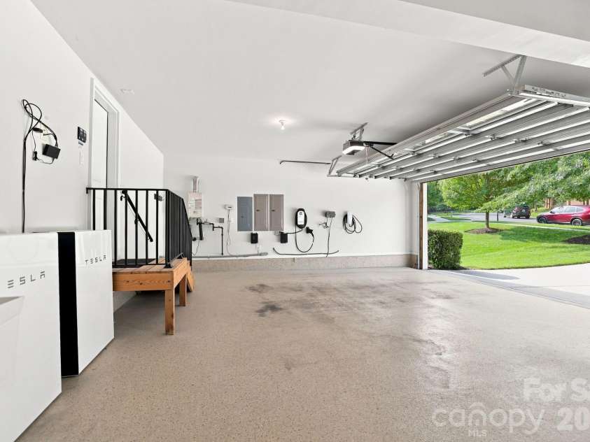 4742 Phifer Crest Court, Charlotte, NC 28226.  MLS# CAR4417441, YatesRealty ID 48482. 3-Car Garage with Epoxy Flooring