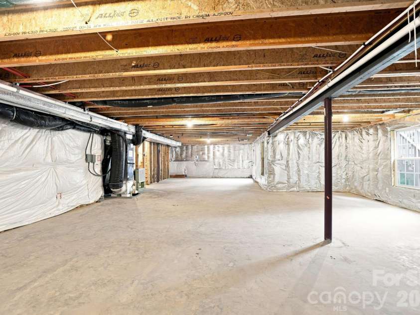 4742 Phifer Crest Court, Charlotte, NC 28226.  MLS# CAR4417441, YatesRealty ID 48482. Unfinished basement