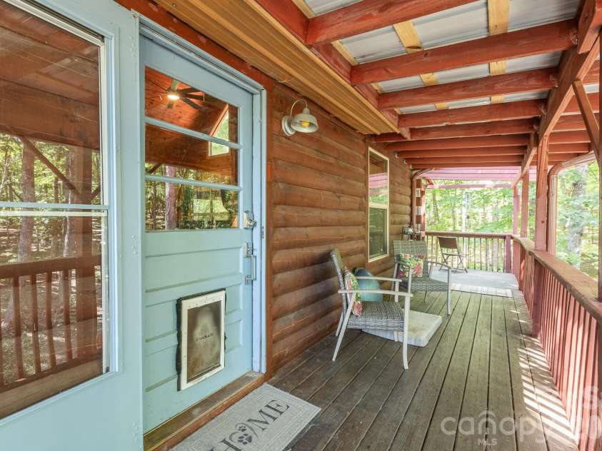 257 Adirondack Trail, Nebo, NC 28761.  MLS# CAR4418359, YatesRealty ID 48489. Front porch & entry door.