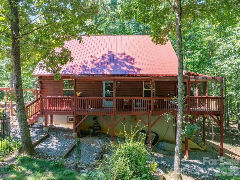257 Adirondack Trail, Nebo, NC 28761.  MLS# CAR4418359, YatesRealty ID 48489. Nestled in the trees.