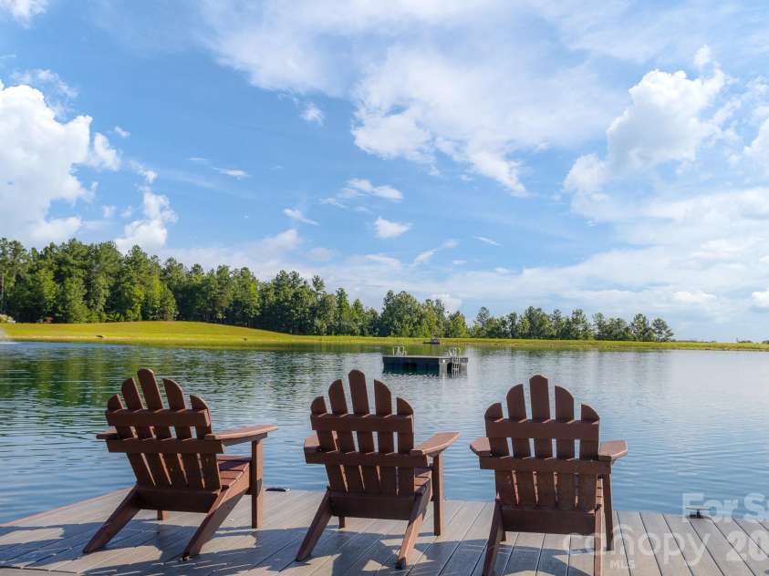 257 Adirondack Trail, Nebo, NC 28761.  MLS# CAR4418359, YatesRealty ID 48489. The private lake.