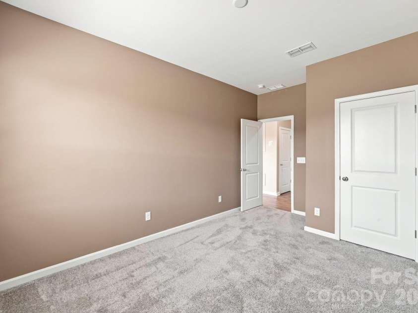 12028 Grinstead Lane, Charlotte, NC 28278.  MLS# CAR4420733, YatesRealty ID 48492. Main Level Guest