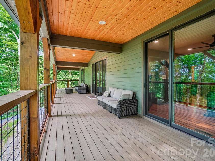 1067 English Ridge Drive, Mars Hill, NC 28754.  MLS# CAR4409023, YatesRealty ID 48493. Main Level Deck