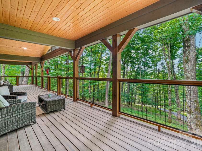 1067 English Ridge Drive, Mars Hill, NC 28754.  MLS# CAR4409023, YatesRealty ID 48493. Main Level Deck