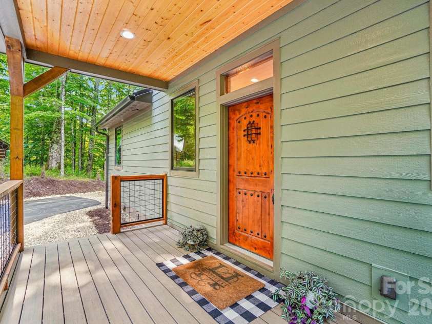 1067 English Ridge Drive, Mars Hill, NC 28754.  MLS# CAR4409023, YatesRealty ID 48493. Nice Cvrd Entry Facing National Forest