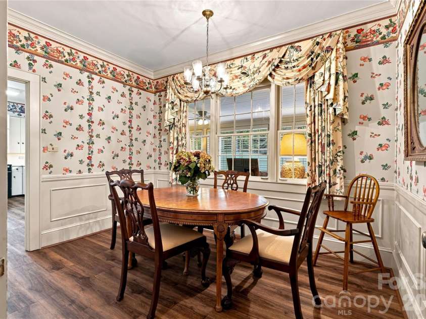 209 Labans Lane, Lincolnton, NC 28092.  MLS# CAR4419321, YatesRealty ID 48497. Breakfast room with built-in cabinetry and backyard views.