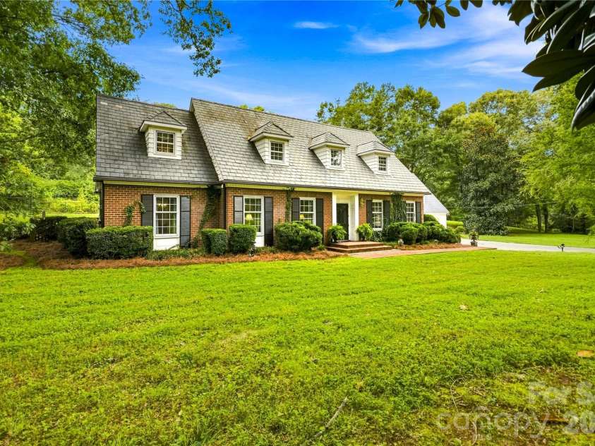 209 Labans Lane, Lincolnton, NC 28092.  MLS# CAR4419321, YatesRealty ID 48497. Classic front exterior with slate roof and dormer windows.
