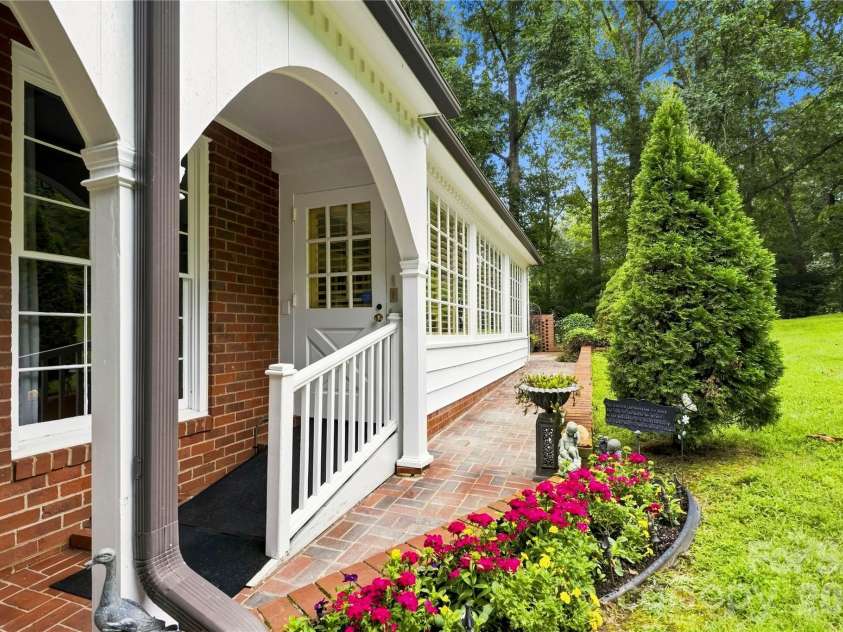 209 Labans Lane, Lincolnton, NC 28092.  MLS# CAR4419321, YatesRealty ID 48497. Covered back entry with traditional brick and architectural details.