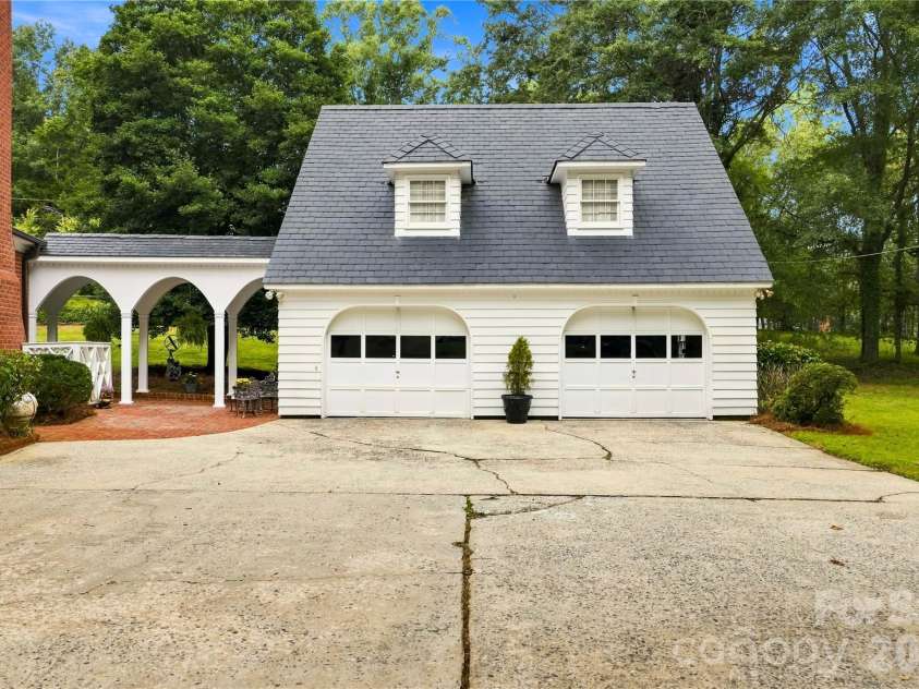 209 Labans Lane, Lincolnton, NC 28092.  MLS# CAR4419321, YatesRealty ID 48497. Detached two-car garage with additional storage above.