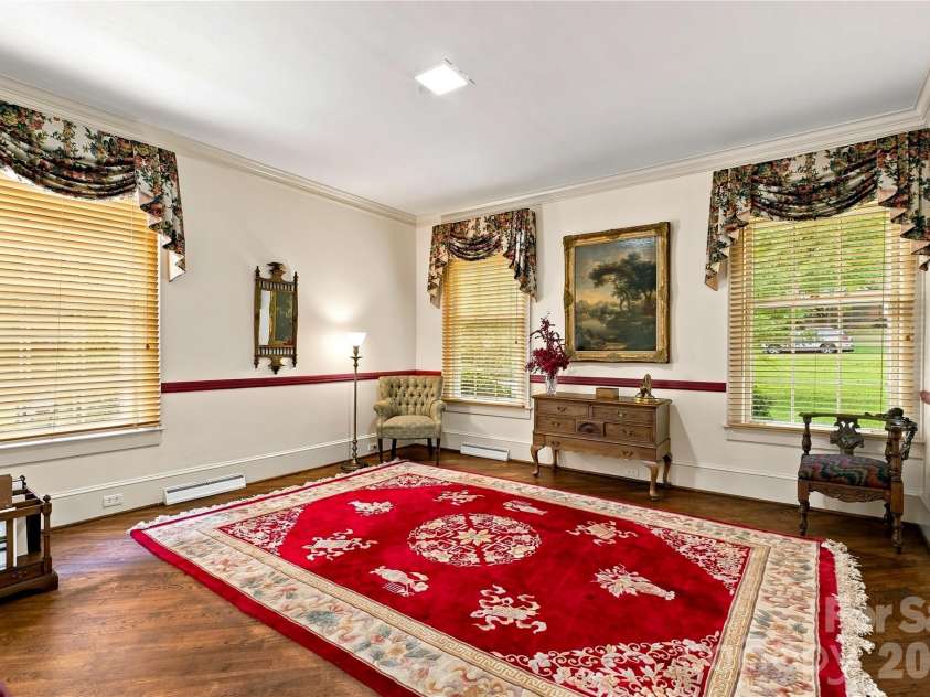 209 Labans Lane, Lincolnton, NC 28092.  MLS# CAR4419321, YatesRealty ID 48497. Main-level bedroom with natural light and an ensuite bath.