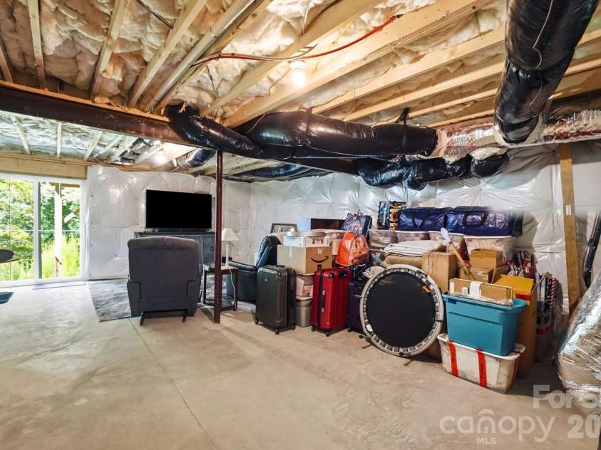 5965 Granbury Drive, Kannapolis, NC 28081.  MLS# CAR4418545, YatesRealty ID 48498. Unfinished basement