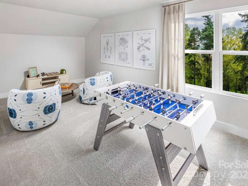 3037 Finchborough Court, Charlotte, NC 28269.  MLS# CAR4204027, YatesRealty ID 485. *This image is not of the actual home, but a photo of our model home, shown for representative purposes.*