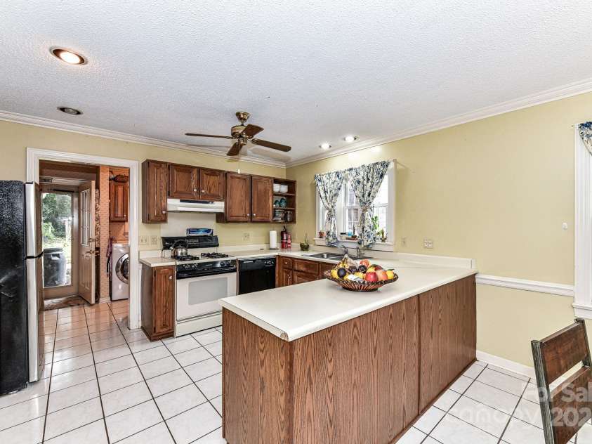 208 Eastwood Drive, Salisbury, NC 28146.  MLS# CAR4177195, YatesRealty ID 4850. Kitchen features plenty of work space, cabinets for storage & 2 pantries!