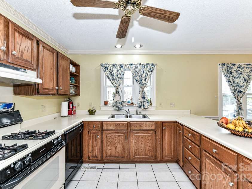 208 Eastwood Drive, Salisbury, NC 28146.  MLS# CAR4177195, YatesRealty ID 4850. Kitchen features plenty of work space, cabinets for storage & 2 pantries!