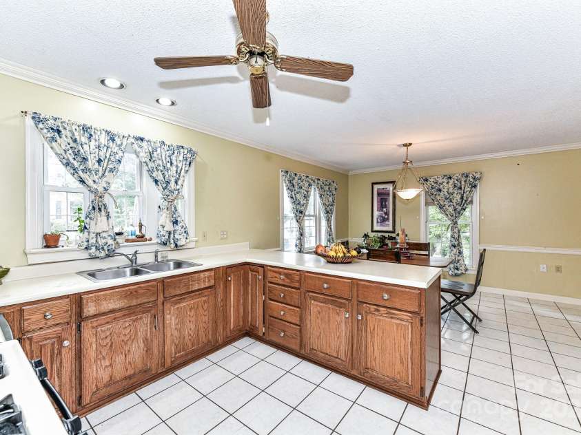 208 Eastwood Drive, Salisbury, NC 28146.  MLS# CAR4177195, YatesRealty ID 4850. Kitchen features plenty of work space, cabinets for storage & 2 pantries!