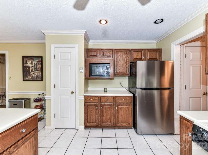 208 Eastwood Drive, Salisbury, NC 28146.  MLS# CAR4177195, YatesRealty ID 4850. Kitchen features plenty of work space, cabinets for storage & 2 pantries!