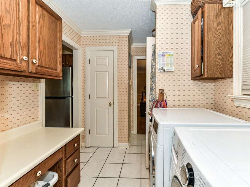 208 Eastwood Drive, Salisbury, NC 28146.  MLS# CAR4177195, YatesRealty ID 4850. Laundry Area with cabinets for storage!