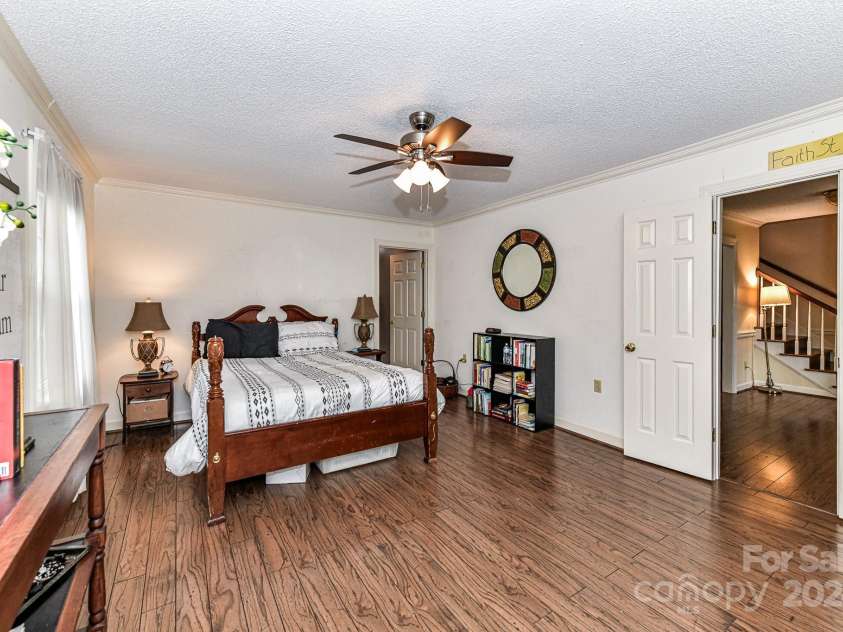 208 Eastwood Drive, Salisbury, NC 28146.  MLS# CAR4177195, YatesRealty ID 4850. Spacious Primary Bedroom on main level with crown molding, ceiling fan/light & private bath!