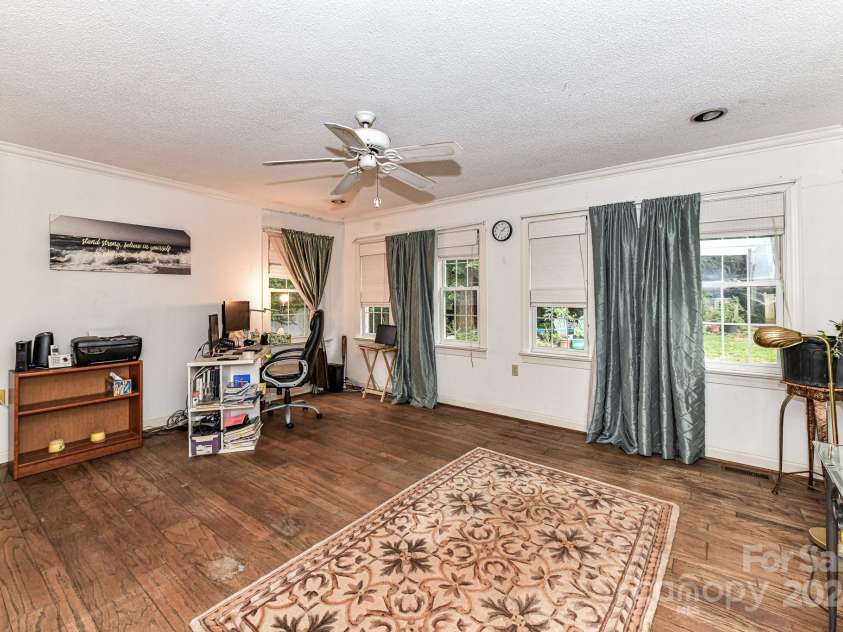 208 Eastwood Drive, Salisbury, NC 28146.  MLS# CAR4177195, YatesRealty ID 4850. Sunroom or Flex Space with ceiling fan, plenty of natural light & crown molding!