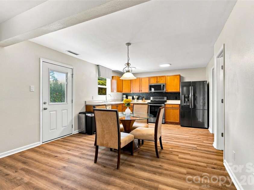 117 Farm Springs Drive, Mount Holly, NC 28120.  MLS# CAR4417237, YatesRealty ID 48501. Dining area conveniently located beside the kitchen