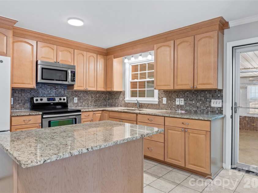 3545 Lakeshore Drive, Clemmons, NC 27012.  MLS# CAR4419434, YatesRealty ID 48503. View of Kitchen wi