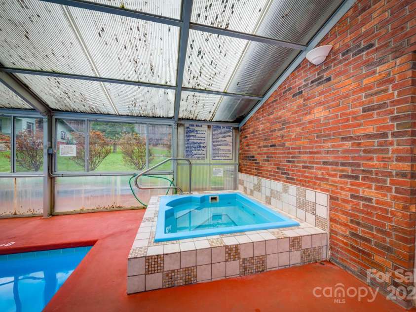 593 Twinbrook Lane, Maggie Valley, NC 28751.  MLS# CAR4200586, YatesRealty ID 4851. Hot Tub