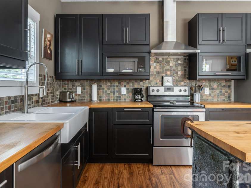 2 Mill Creek Loop, Asheville, NC 28806.  MLS# CAR4420217, YatesRealty ID 48511. Farmhouse sink, gorgeous cabinets