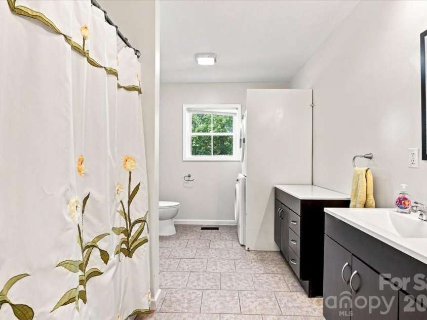 2 Elkmont Place, Asheville, NC 28804.  MLS# CAR4417768, YatesRealty ID 48512. 2nd bathroom with laundry